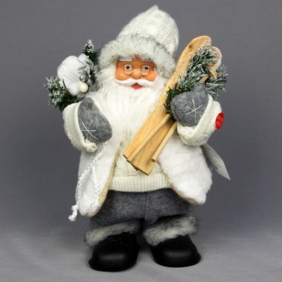 Новорічна інтерактивна фігурка Дід Мороз в білому в'язаному одязі з подарунками та лижами, 25 см (230402) 230402 фото